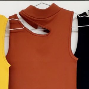 BNWT COPPER MOCKNECK CUTOUT RIBBED TANK. One size fits all (up to a size 10)
